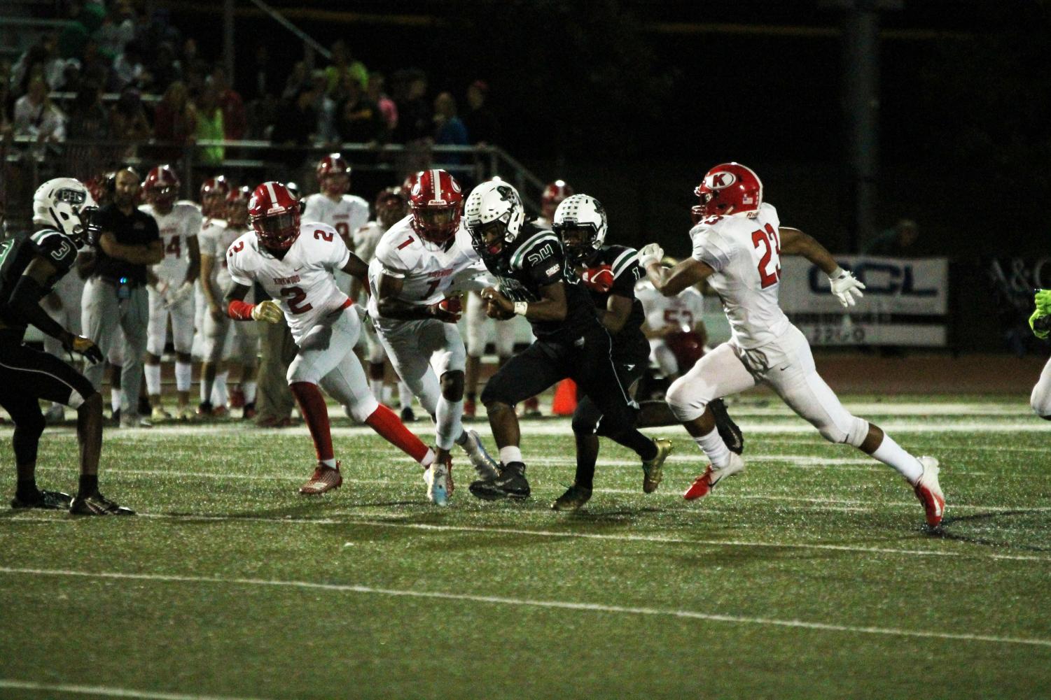 Sam Sanderson breaks free for a 50-yard touchdown run in the 3rd quarter against Kirkwood.