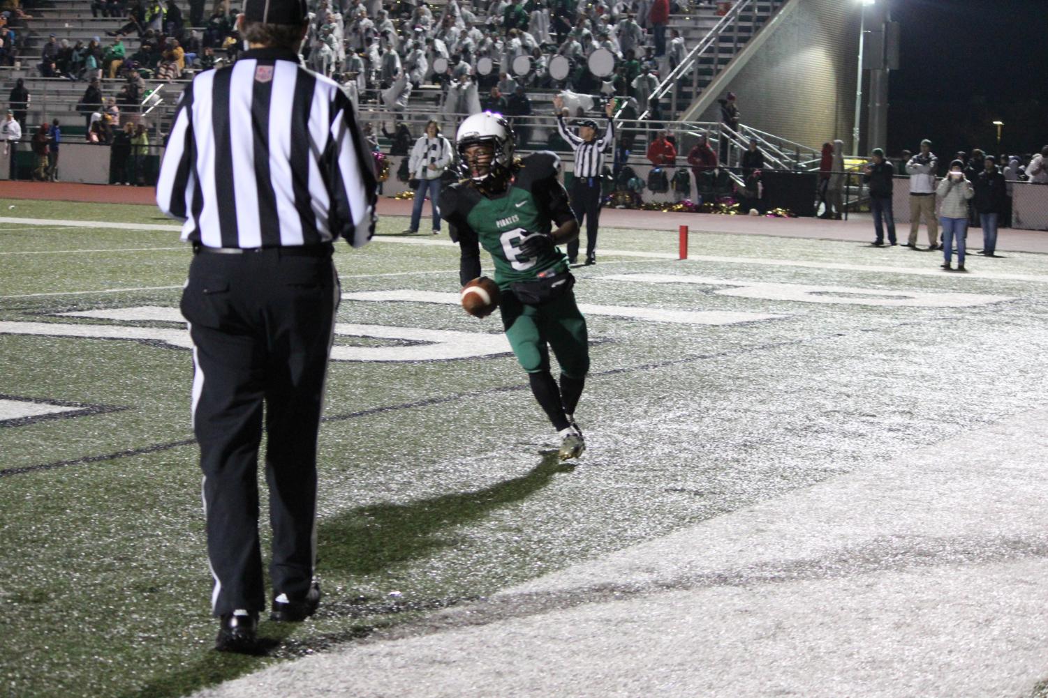 Charles Johnson Jr. runs into the end zone to score for the Pirates. Ladue won the Homecoming game against Pattonville, 35-7