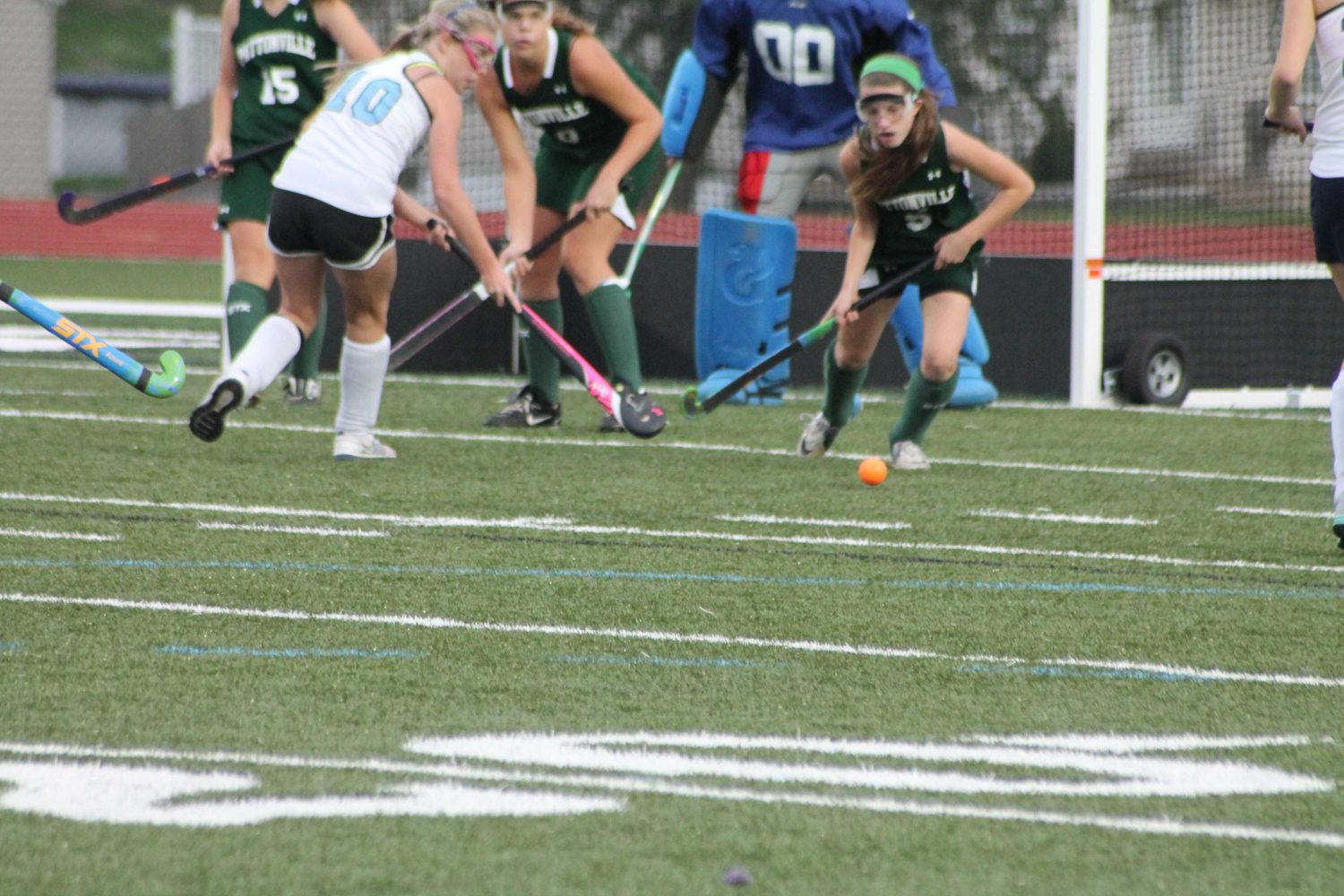 Barringhaus playing in a field hockey game last fall.