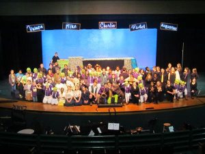 The cast of Willy Wonka takes a company picture and posted it to their Twitter account on Wednesday.