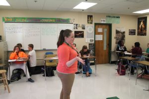 Ms. Williams answering a students question in her 6th hour class