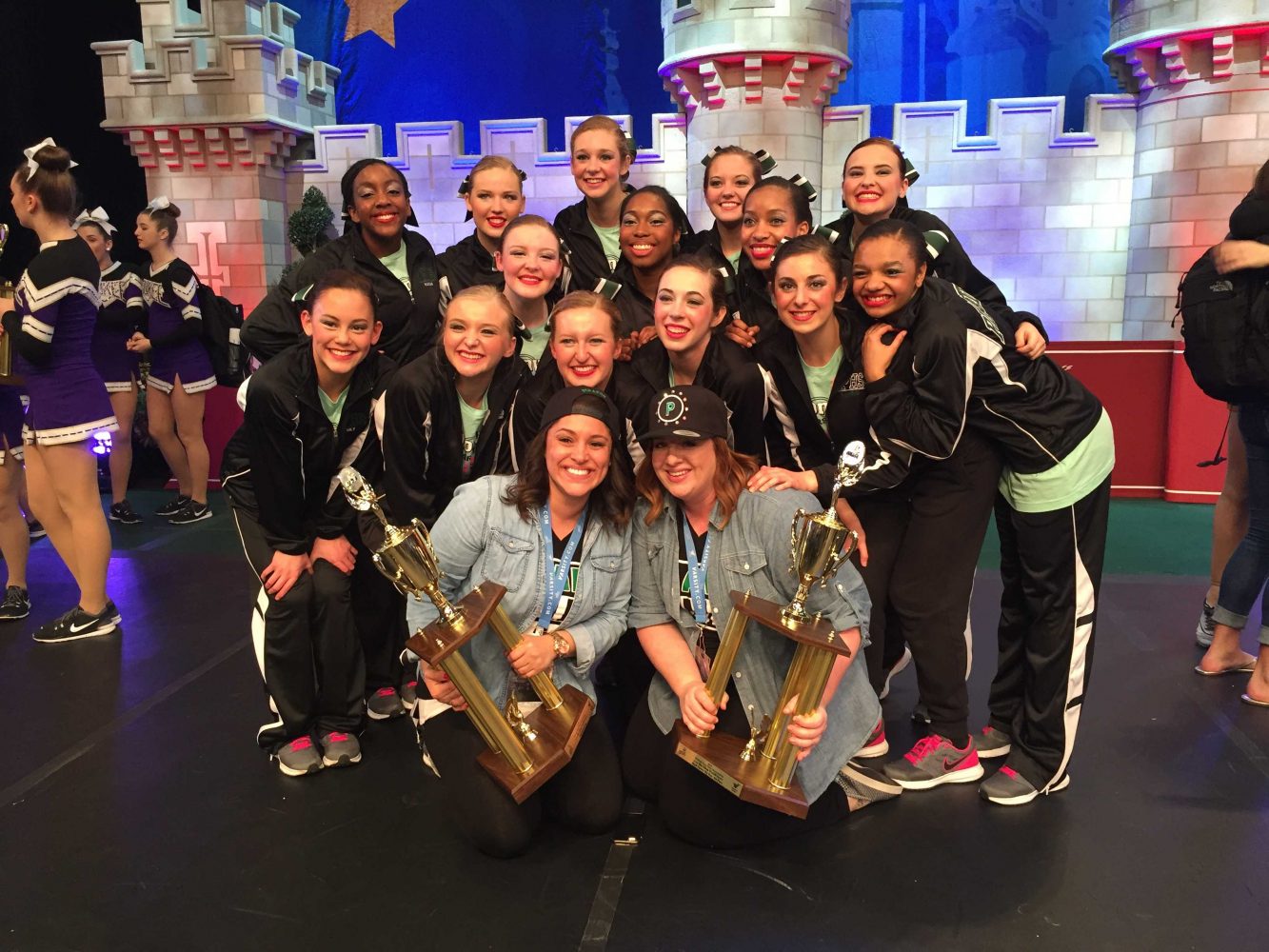 The Varsity Drill Team poses with their trophies for finishing in 8th place and 16th place in hip hop and pom, respectively, at Nationals on Sunday, Jan. 31. (Submitted photo) 