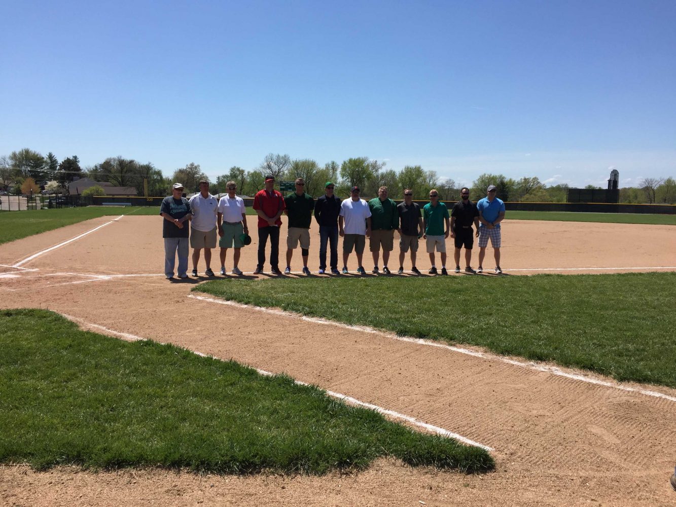 Baseball honors 1986 state championship team, go 1-1 during doubleheader