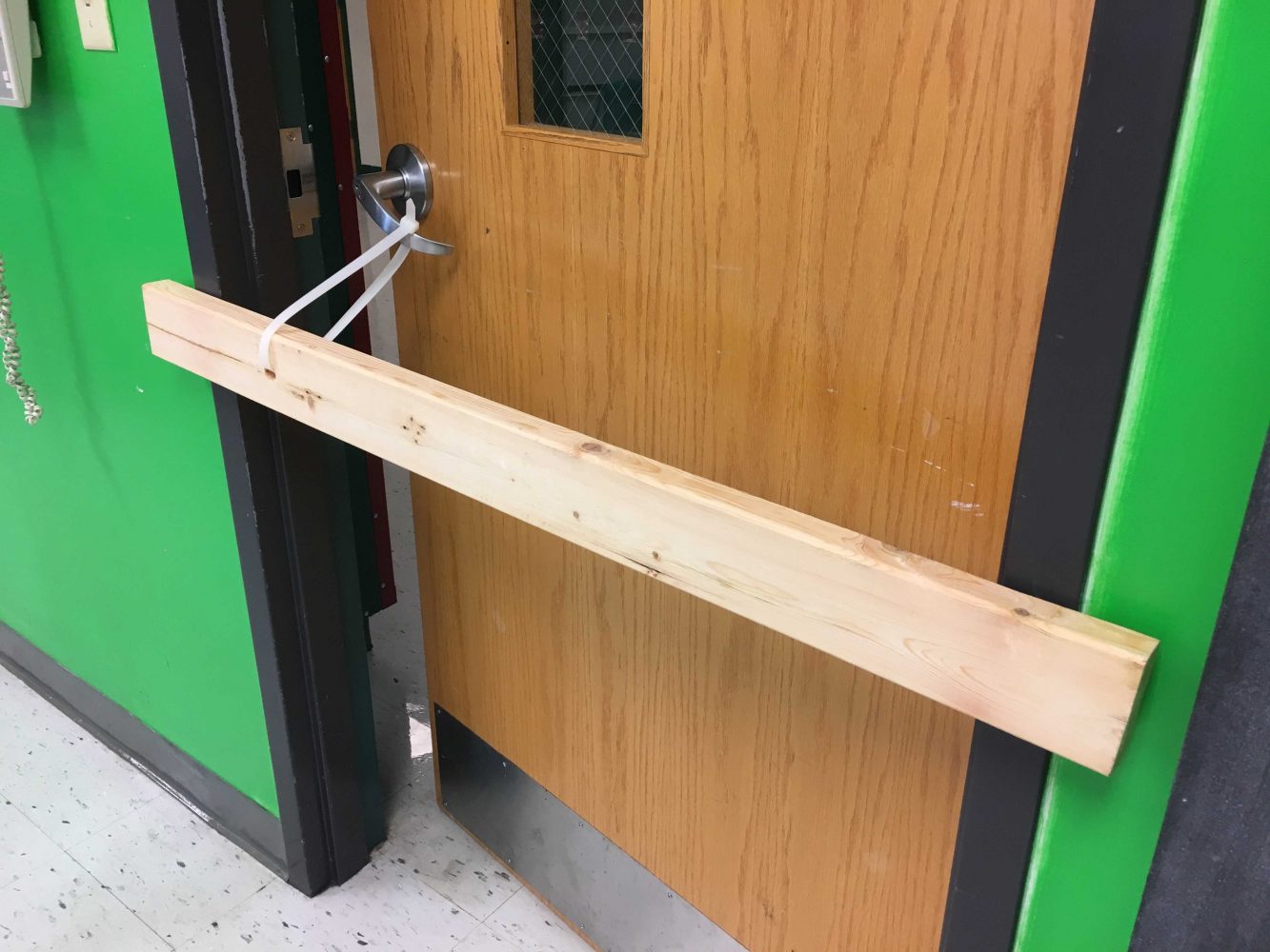 Boards supplied to teachers to block intruders from entering classrooms