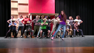 Cast members of Curtains rehearse for the high school musical running Feb. 16-19.