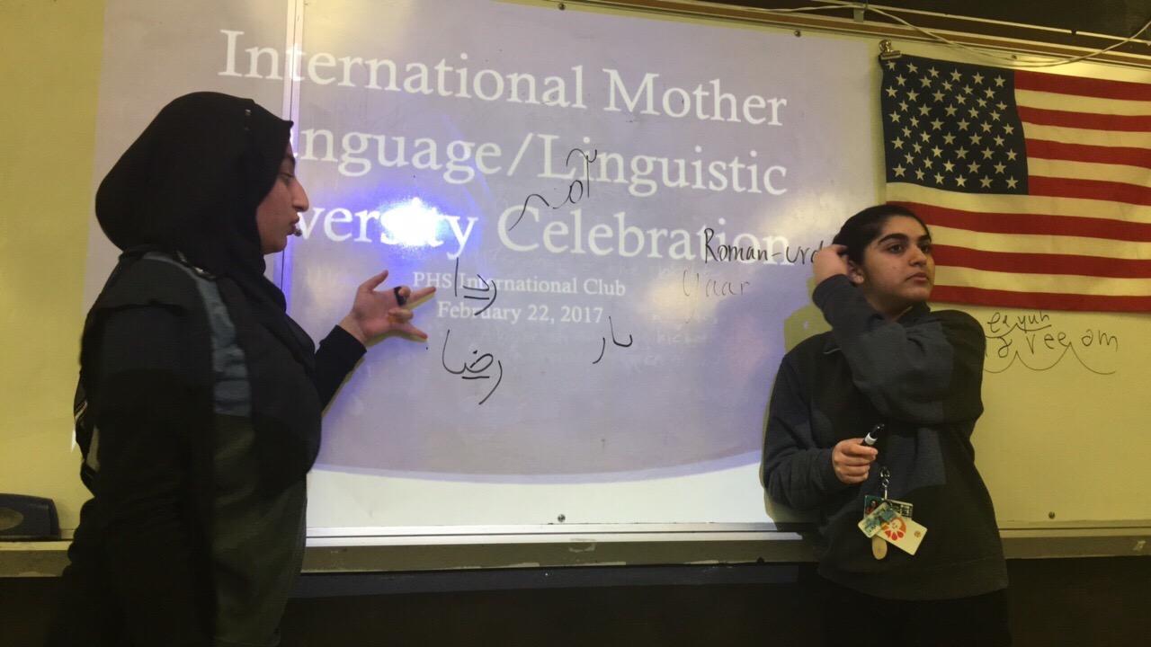 Club members teaching others their languages
