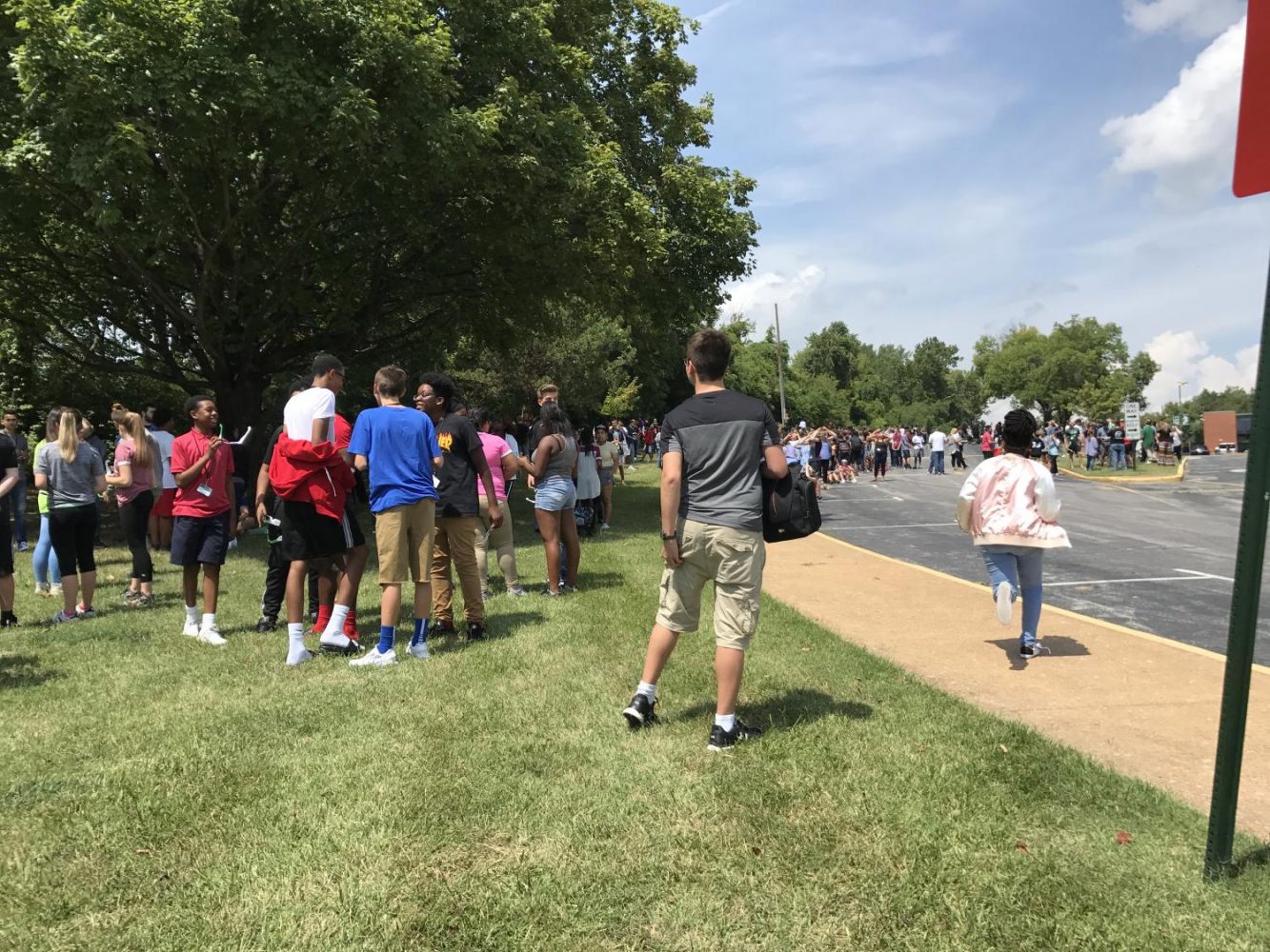 Students gather outside to watch solar eclipse during 7th hour