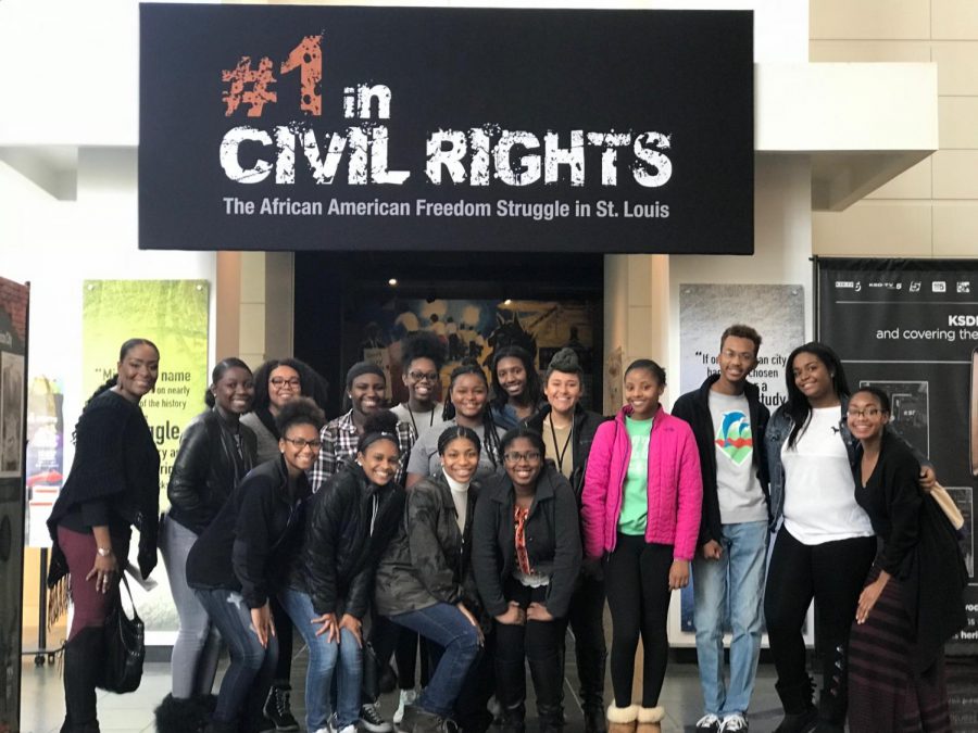 Students pose for a picture outside of the Civil Rights exhibit.