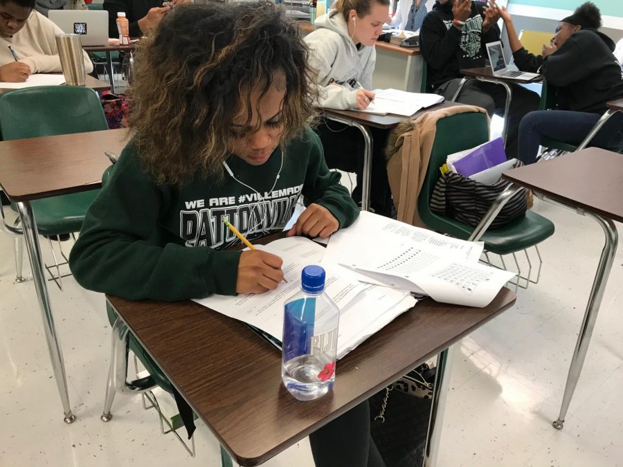 Titalia Long, (12), studies for Probability and Statistics test in Mrs. Gossetts 4th hour.