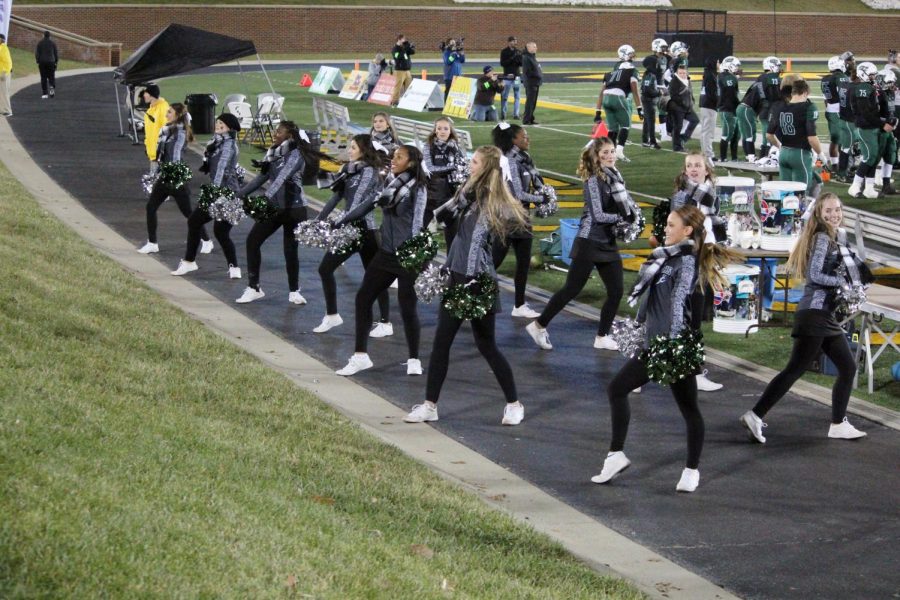 The Varsity Drill Team performs at the football state championship game at the University of Missouri. 