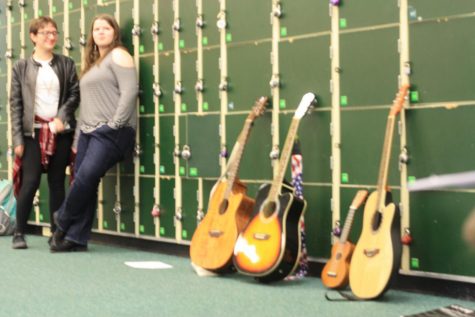 The gorgeous guitars sitting against the lockers.