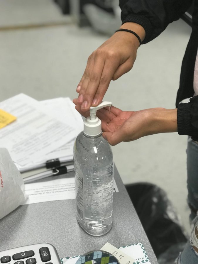 School gives teachers hand sanitizer for the classroom