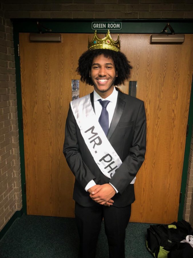 Mr. PHS 2018 Yohanes Mulat poses after being crowned as the winner