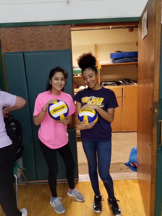 Students help manage the boys volleyball team