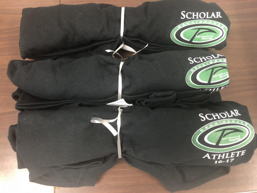 The black scholar athlete t-shirts from the last year. The color is changed each year so that students wont get the same shirt twice.