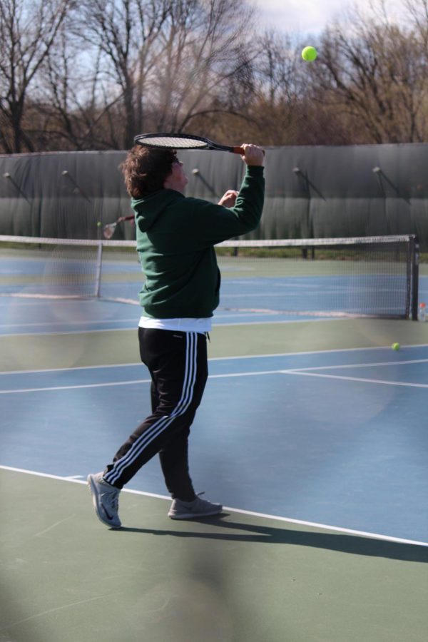 Eric Lee serves during a match earlier in the season at Pattonville High School.