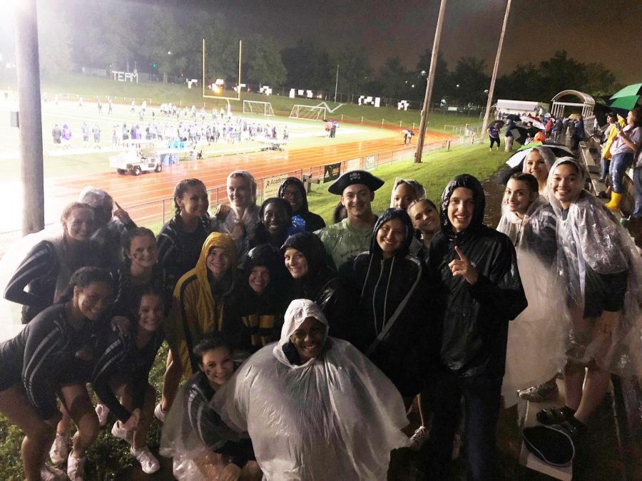 Students that attended the weather-delayed game at Parkway North gather for a group picture during a break in the action.