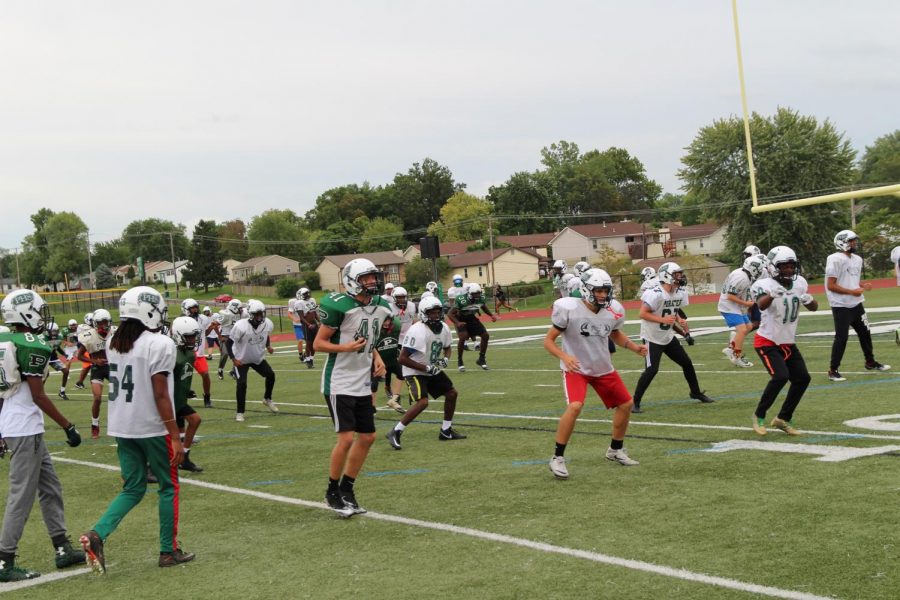 The football team practices after school before its next game.