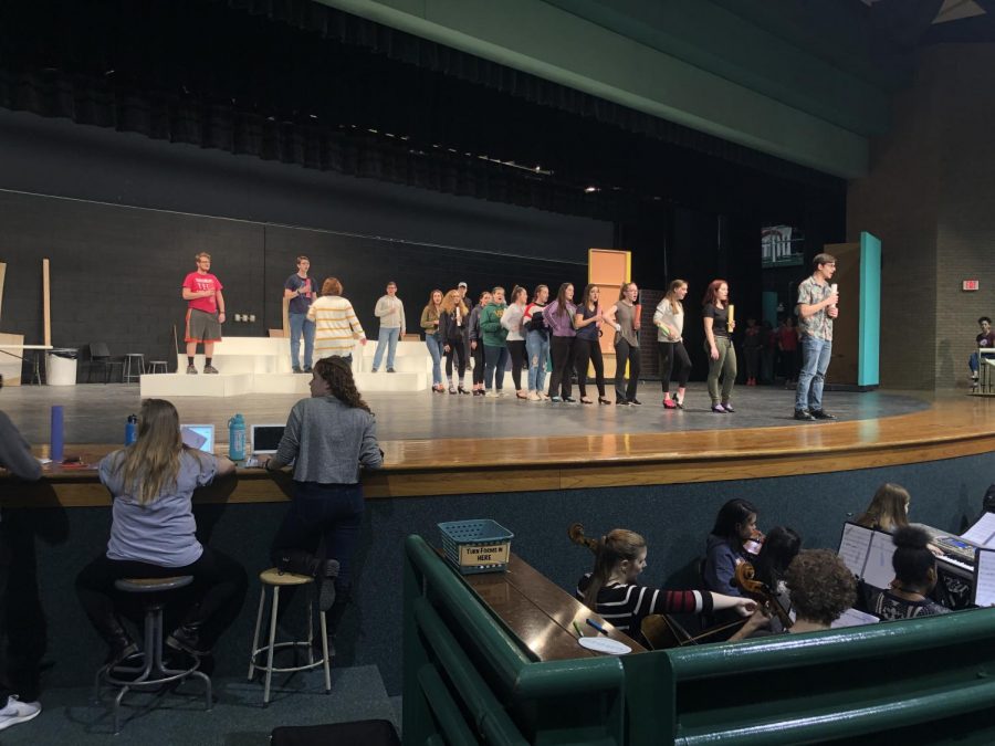Students+rehearse+the+high+school+production+of+Hairspray.+