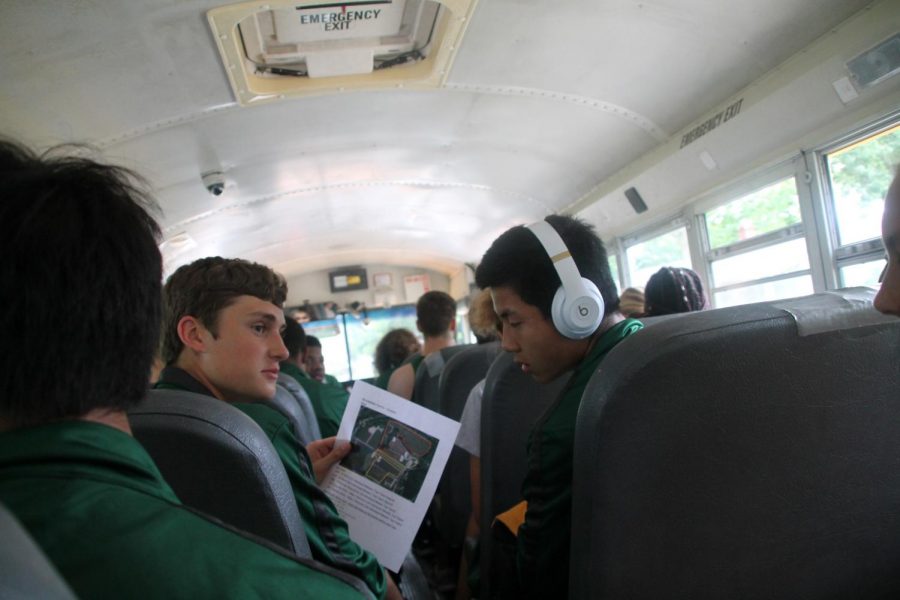 On their way to the first Cross Country meet, Justin Bowers and Kai Mills examine the trail. 