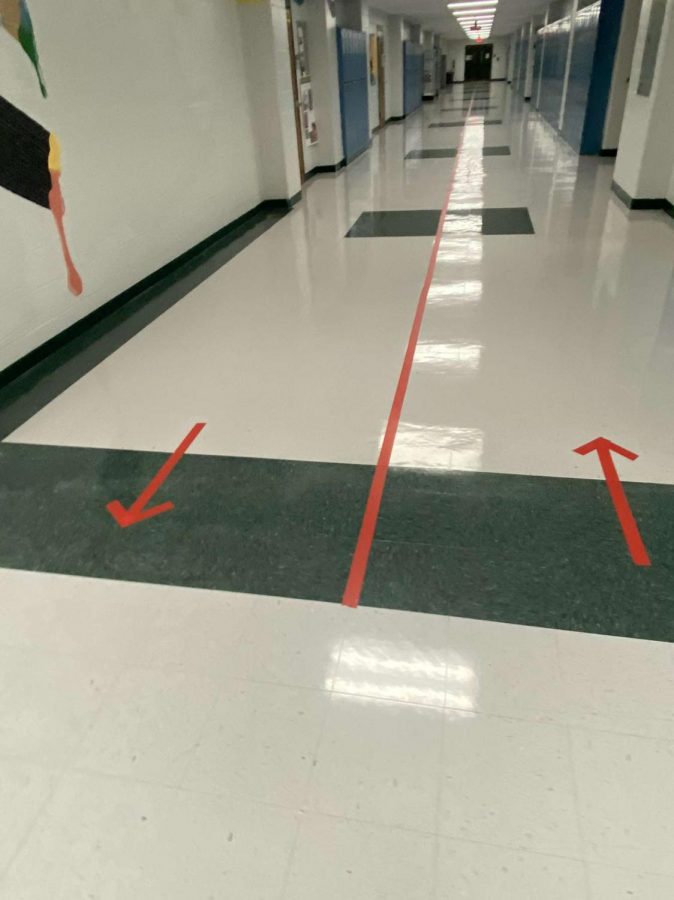There are guiding arrows at PHS on the ground to help students figure out which way to go in the hallways to cross the least amount of people on their path to class.