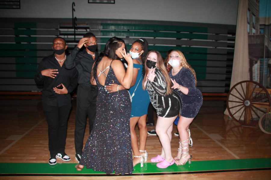Cameron McCadney wore an all black style because I had no other choice. Thats all I had at home.  His favorite part of the homecoming outfit was  my Cuban necklace, McCadney said. 
Pictured: Camera McCadney, Deandre Rose, Tatyana Seay, Grace Schumer, Anyia Lasure, and Kayla Eastman 

