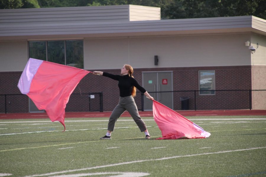 Camille+Lofland+practices+her+homecoming+routine.++Lofland%2C+a+senior%2C+joined+Winter+Guard+for+the+first+time+after+Color+Guard+season+ended.%0A