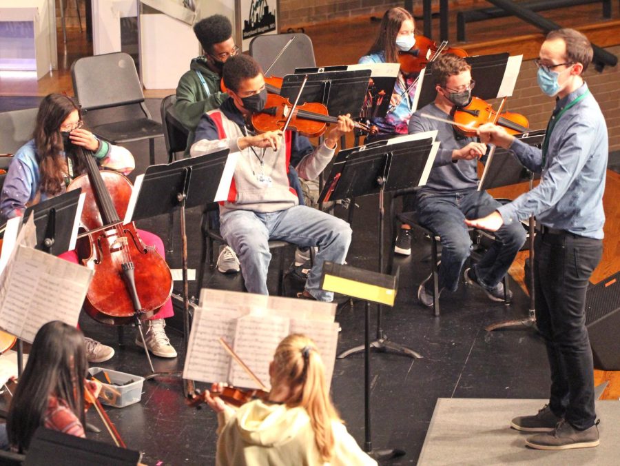 During class on Tuesday, October 26, Chamber Orchestra rehearses Danza and Ellis Island on stage. Emma Schonhoff, violinist in Chamber, says that she is excited about the concert because it gives us a chance to show off our work in front of family and friends, and the experience brings us closer as a group.