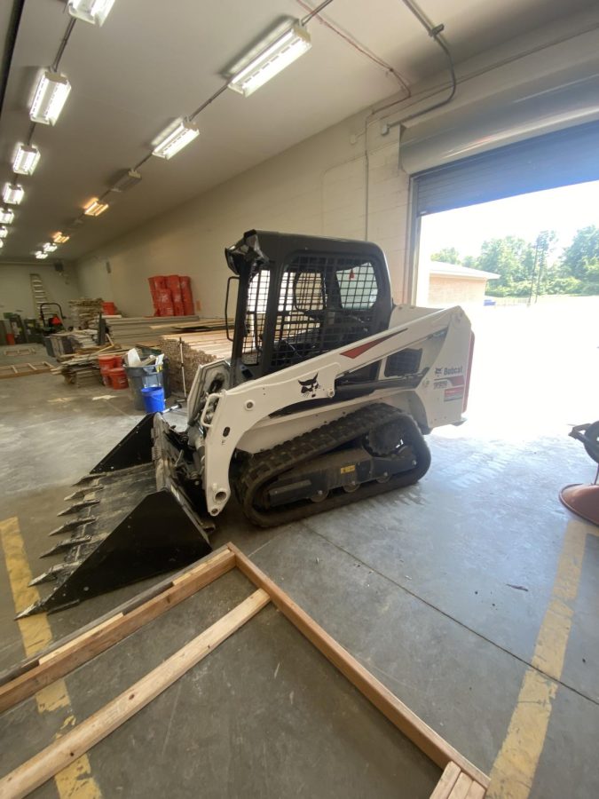 A skid steer from the construction class. This piece of equipment can break concrete. Students learn how to use them at North Tech.