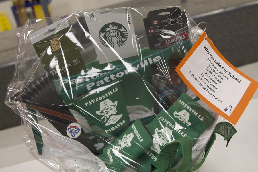One of the many baskets was a Pattonville themed basket called Why Im Late for School. It included $15 Panera Gift card, $15 Starbucks Gift Card, $5 QT gift card, Ice Scraper, Phone Charger, 4 Pirate koozies, and 2 Pirate License Plate Covers. 