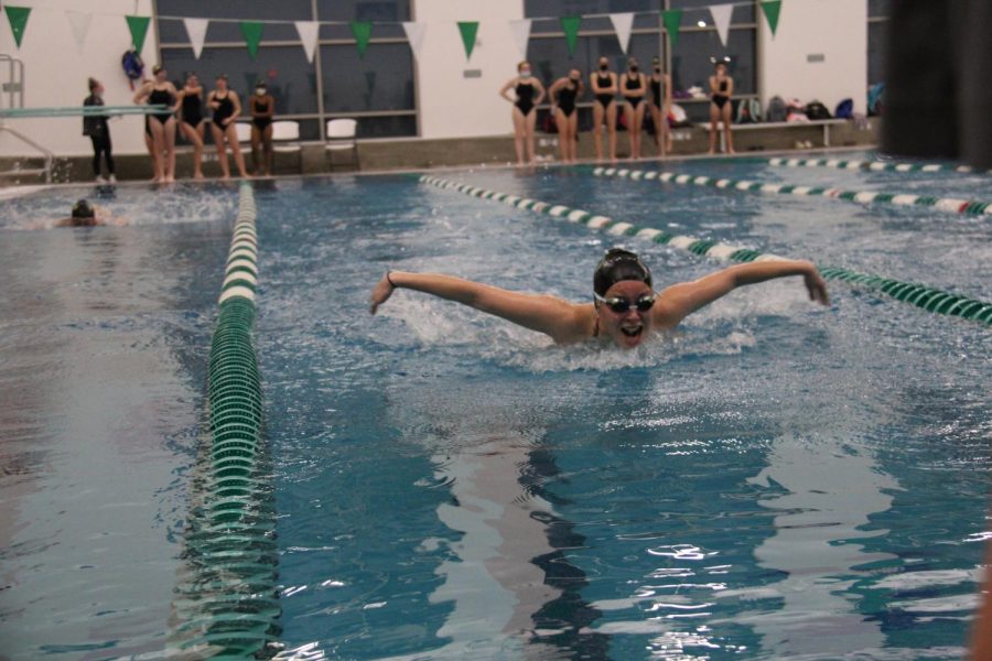 Lucy Ridings executed the butterfly technique at a competitive swim meet against Oakville. 
