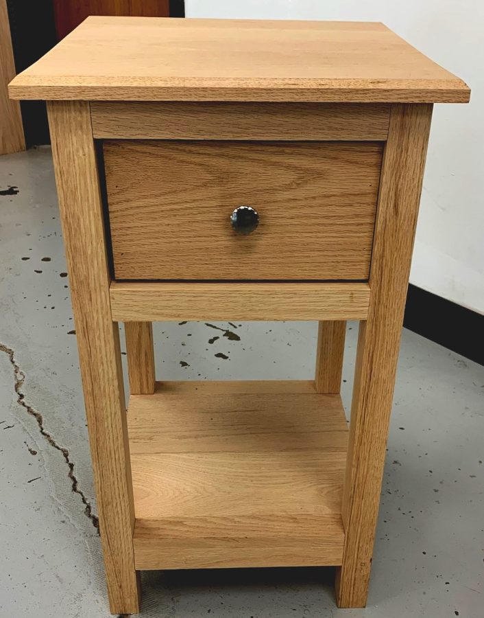One of the final projects that students can build is a tall table with a drawer and a bottom shelf.