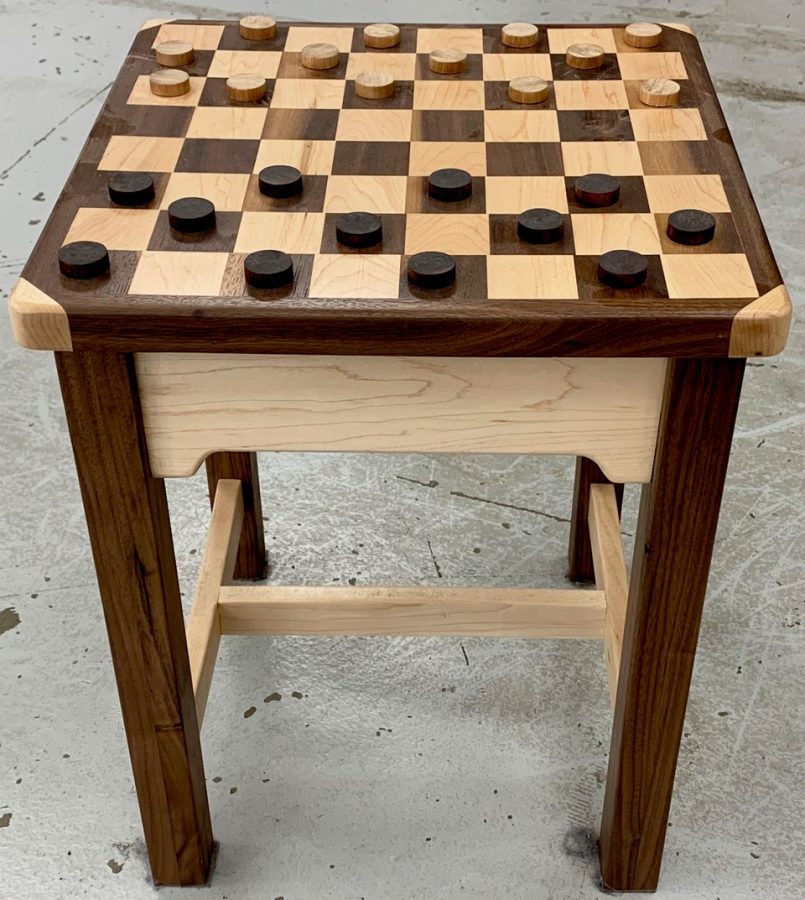 Another project that students can build is a chess table with chess pieces.