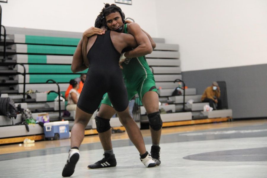 Mehki Brown contends with Webster Groves wrestler during their meet on December 15, hosted by Pattonville.