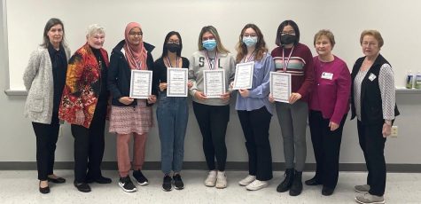 From left to right, Maryam Ilyas, Maichi Nguyen, Selena Riede, Devin Scharer, and Sydney Suvransri are awarded the STEM Girls of Promise Award by the Ballwin/Chesterfield Chapter of AAUW on April 18.