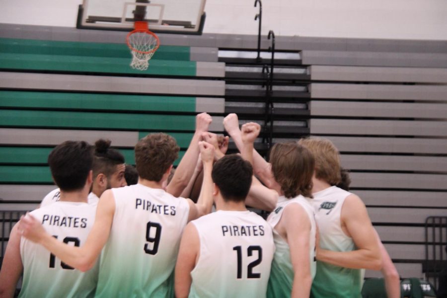 Pattonville+varsity+boys+volleyball+huddles+discussing+strategies+for+the+next+set