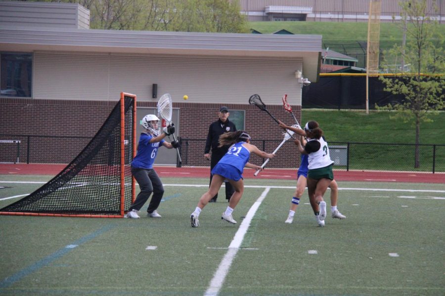 Chloe Kerwin (3) scores her first goal of the game in the Ladue V. Pattonville game.