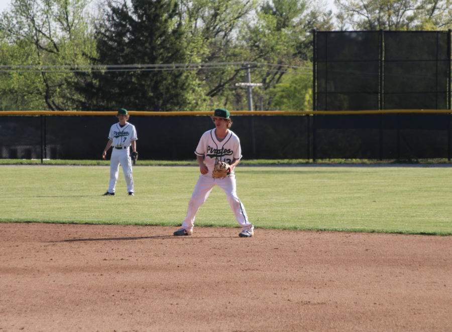 Jacob Baalmann gets down and ready in his position as a second baseman in Pattonville's game against Ladue on April 5.