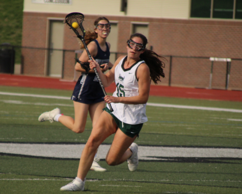 Hannah Fisbeck takes the ball on a turn over and leads the attack.