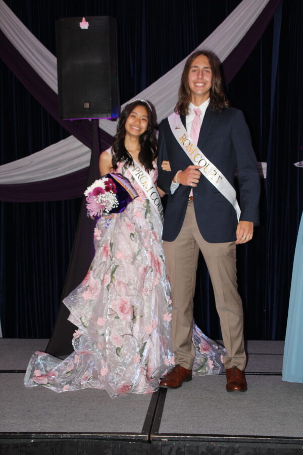 Prom+king+and+queen%2C+Beckett+Grabner+and+Maichi+Nguyen+take+the+stage+right+before+being+crowned.