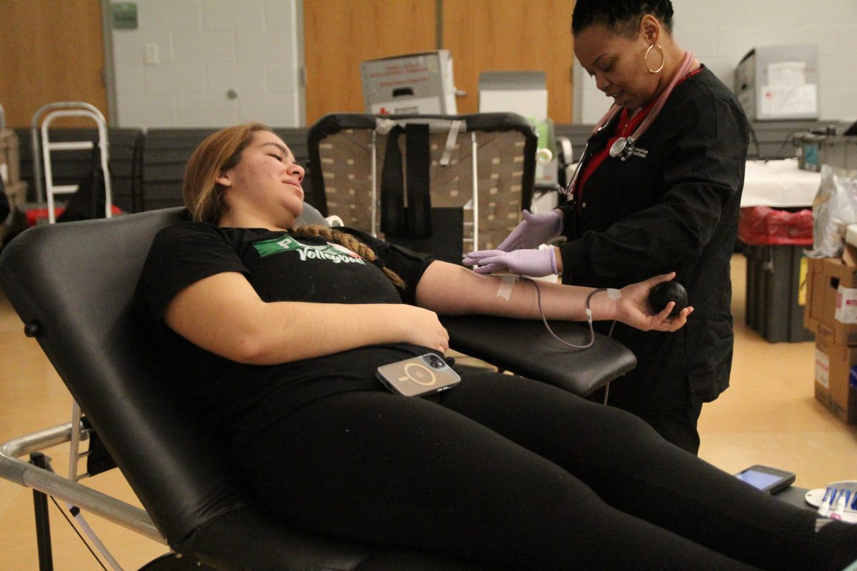 PHS+students+gave+blood+on+February+23+when+PHS+and+the+Red+Cross+hosted+a+semi-annual+blood+drive.