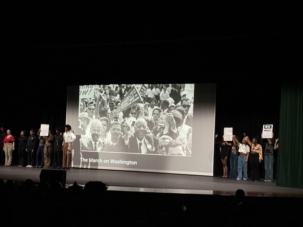 Members of the Triple A club take part in the tribute to the March on Washington of the 1960s. 