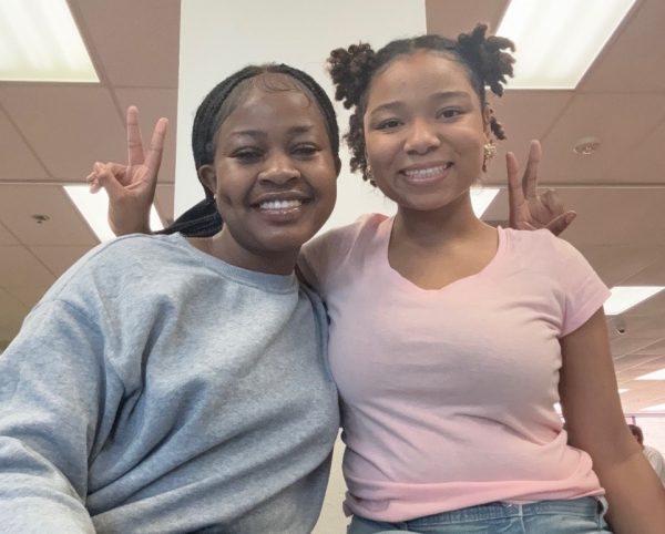 Staff writer Shauntavia Conway reconnects with junior Danielle Adory.  Both Shauntavia and Danielle were new to PHS this year. 