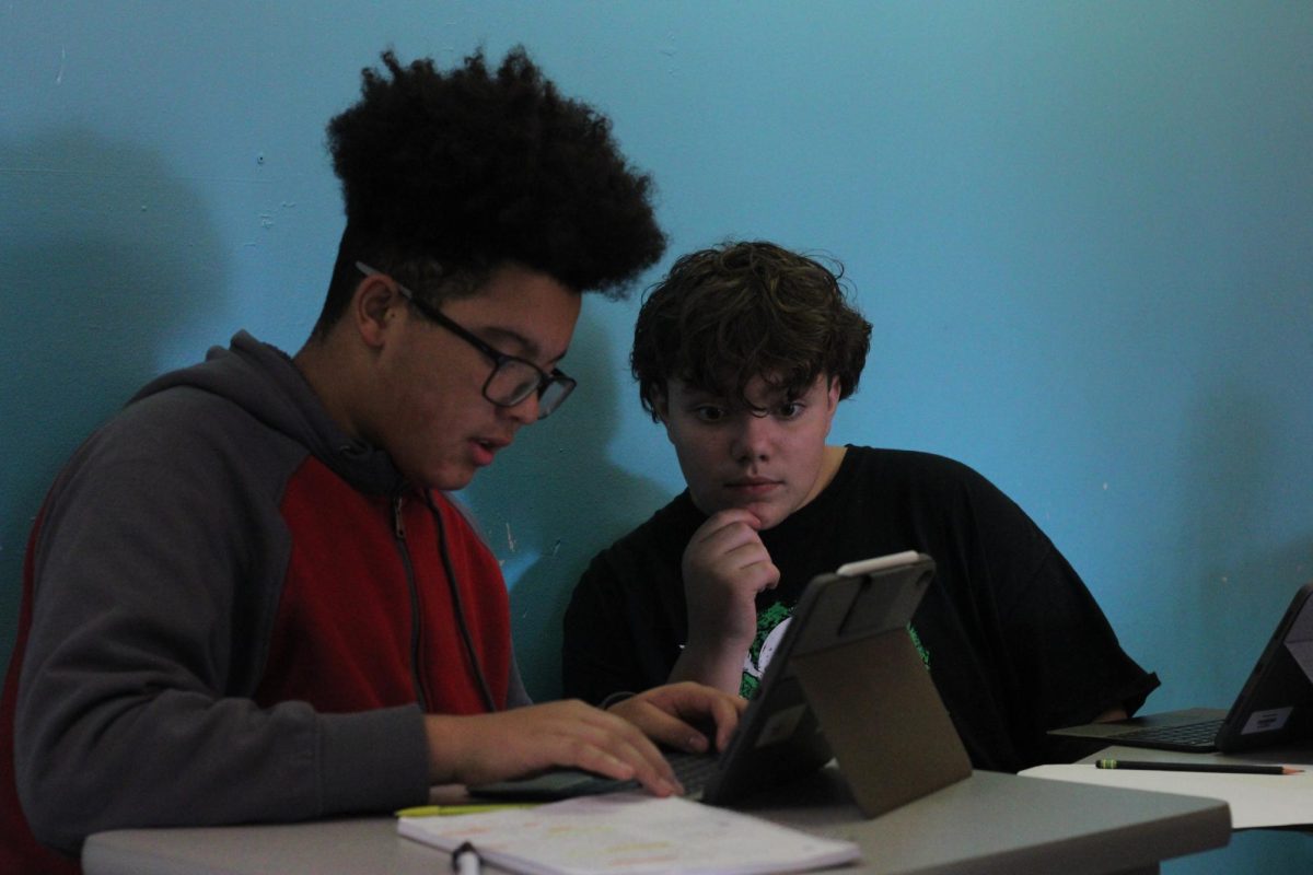 Mayson Tripp (9) and Alexander Nichols (9) working on a class project for Lori Cole's Honors Early Modern World History class on September 24.